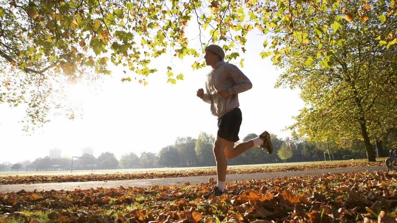 young-man-running-park