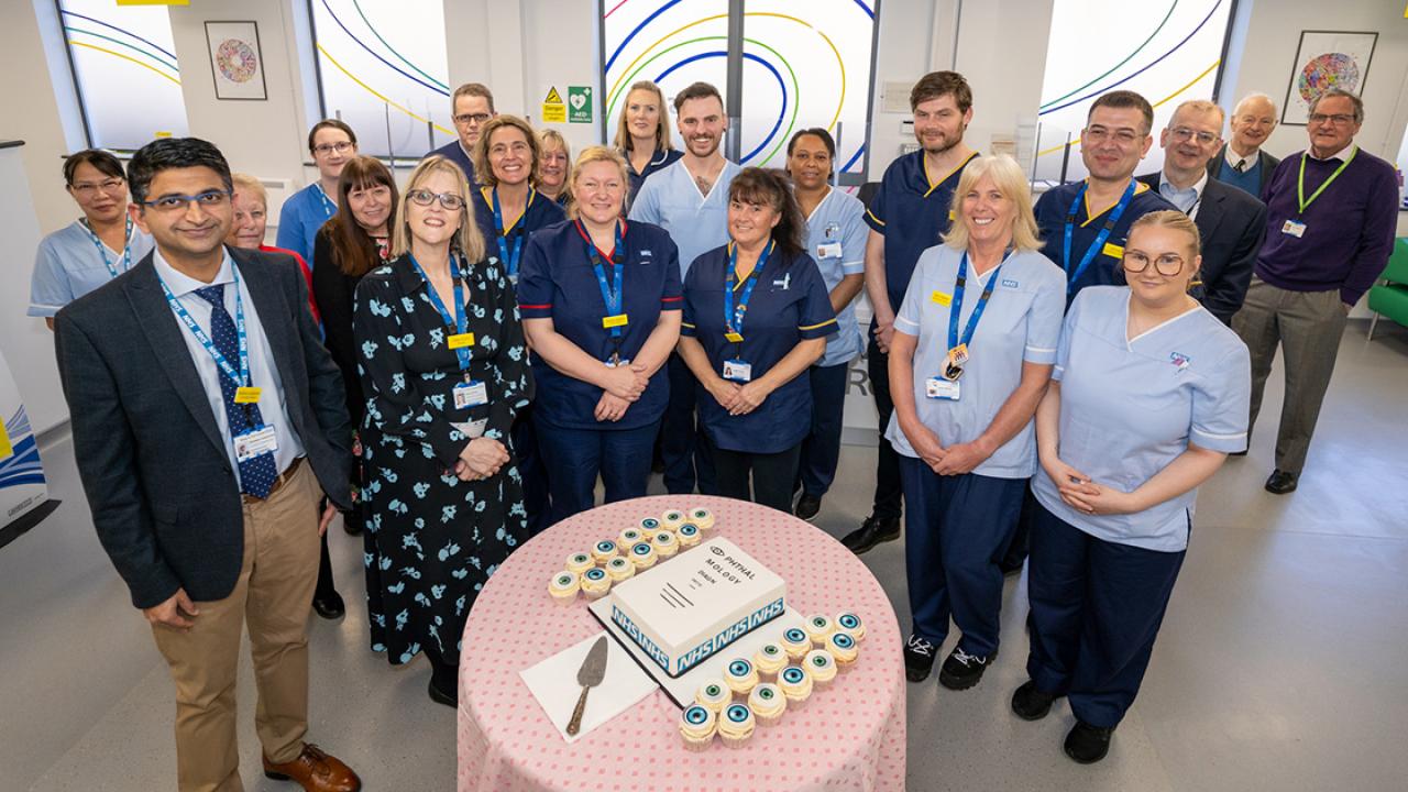 NHS macular treatment - Team with cake